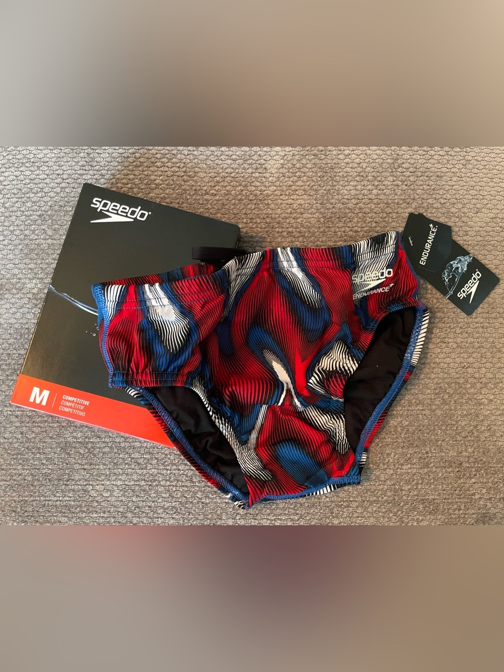 Speedo Men's Sz 28
Endurance+ Swim Brief in Red, Blue, White